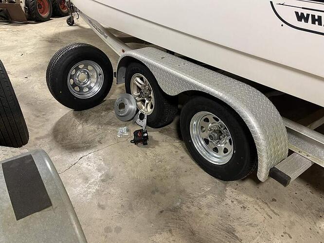 Whaler Trailer New Tires and Brakes.jpg